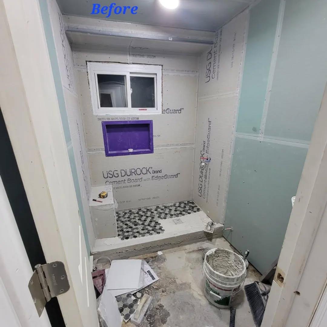 Bathroom renovation before - construction phase showing exposed materials and work in progress